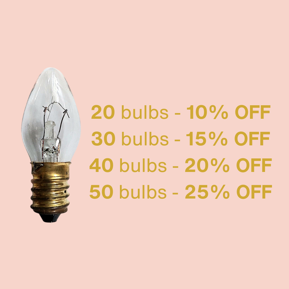 Light bulb with promotional text on a pink background
