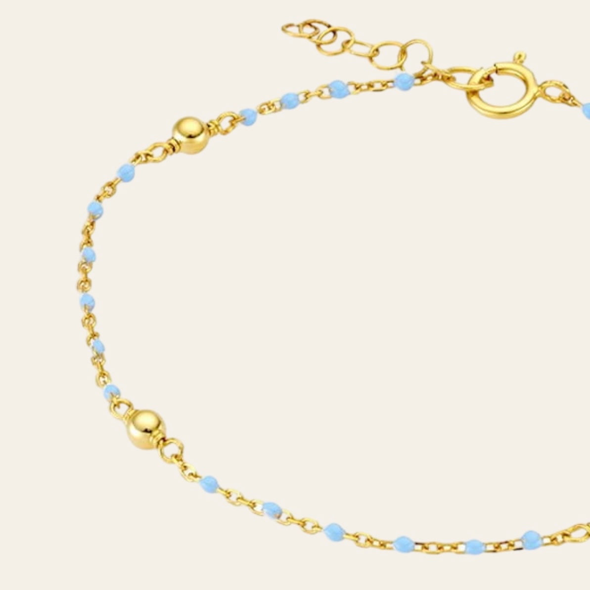 Blue ball chain bracelet in gold 