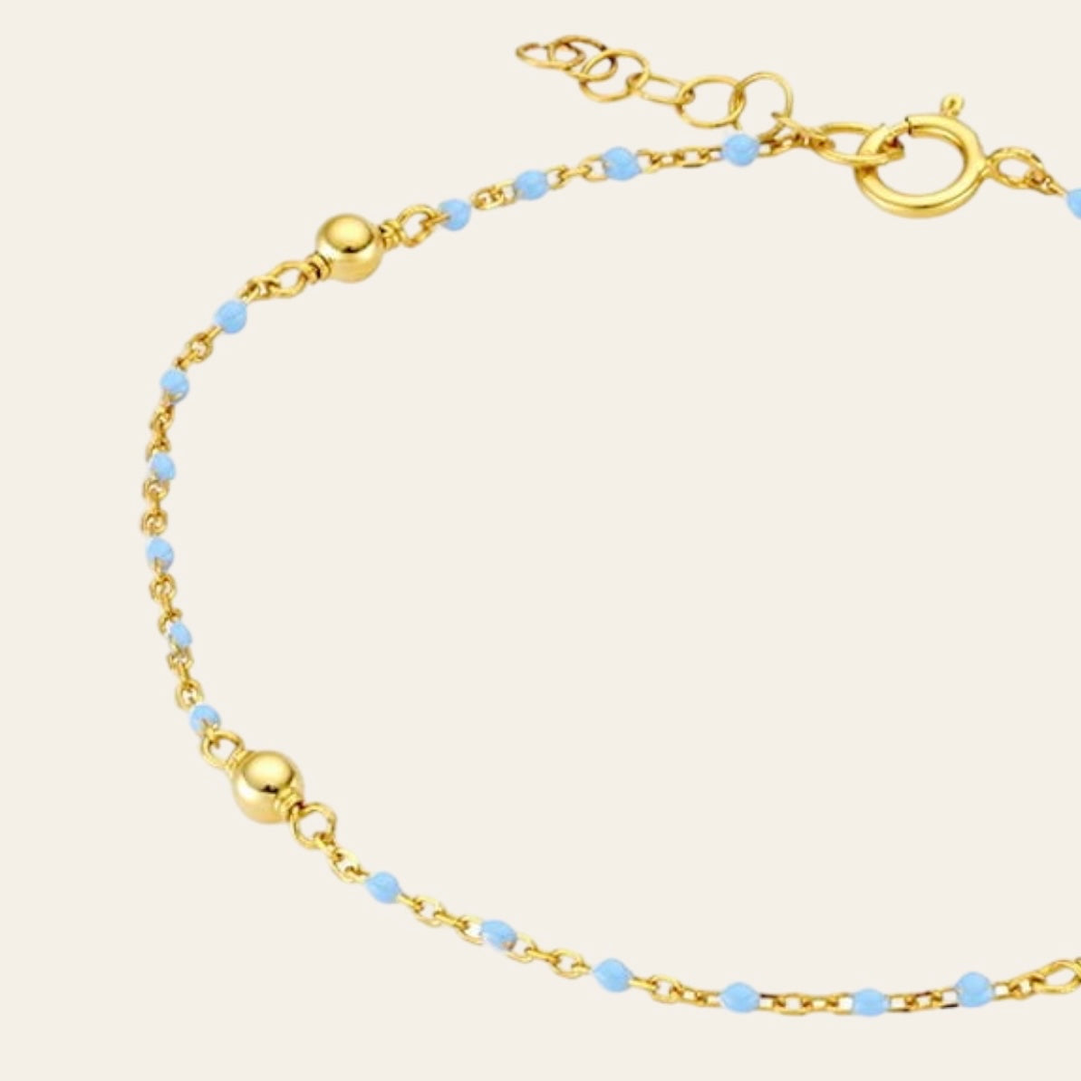Blue ball chain bracelet in gold