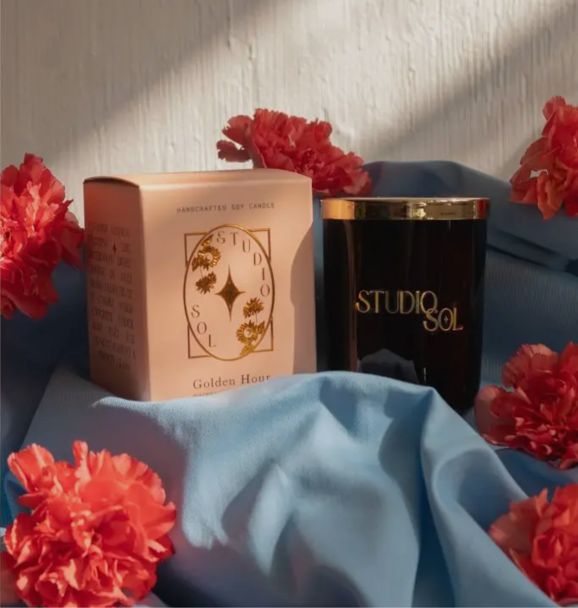 Golden hour candle with flowers display