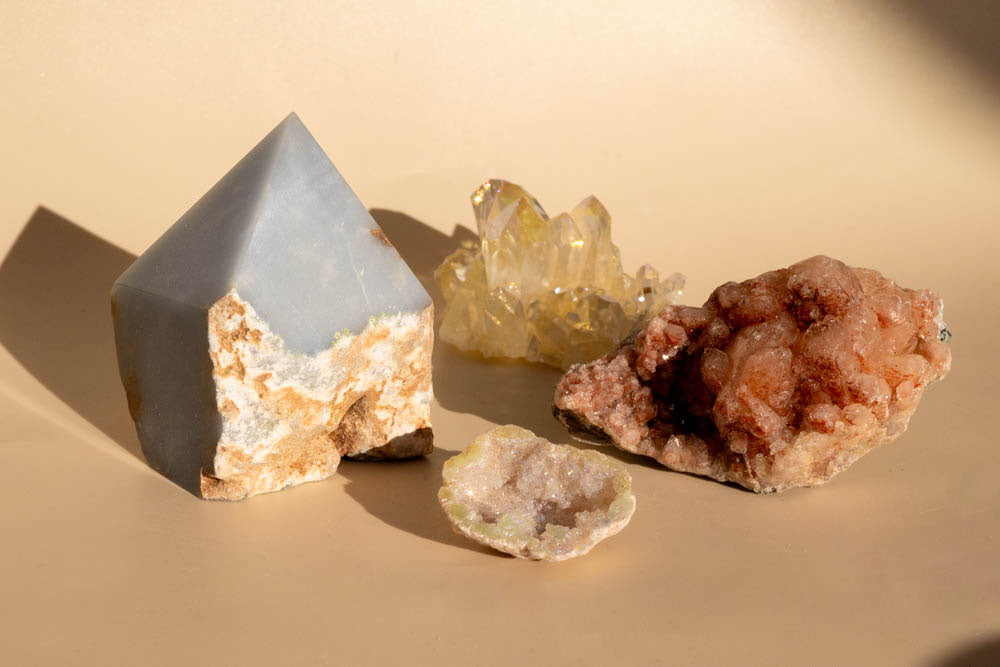 Angelite Top Polished Crystal Generator on beige background