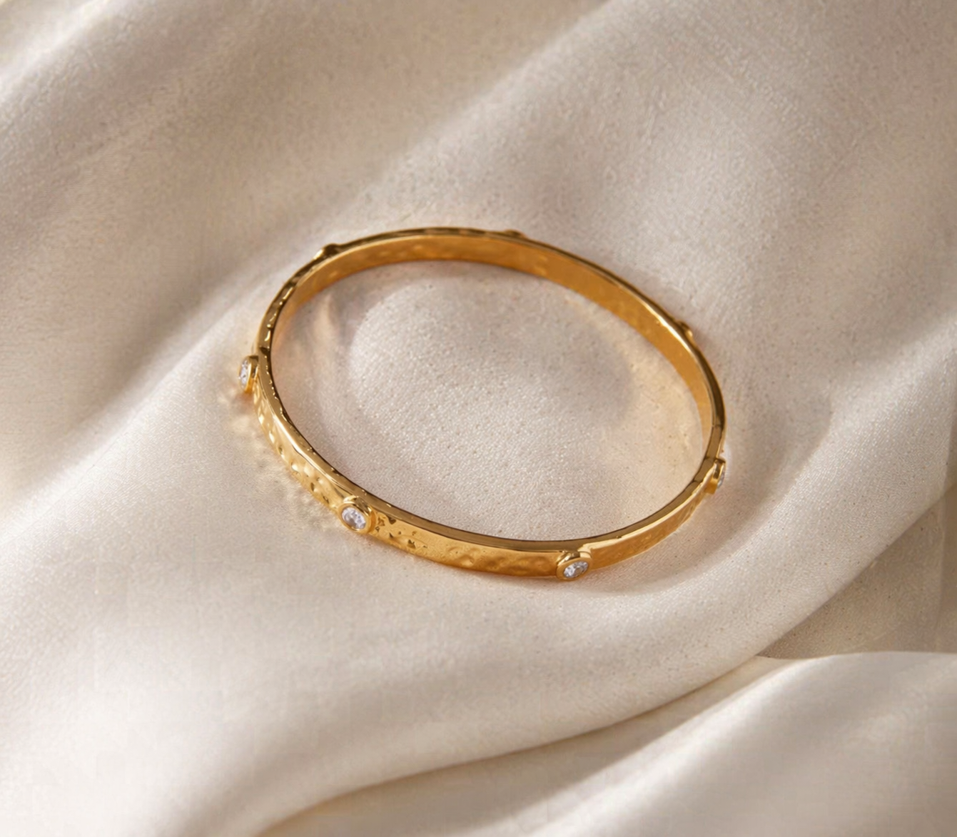 Lola textured bangle on cream background