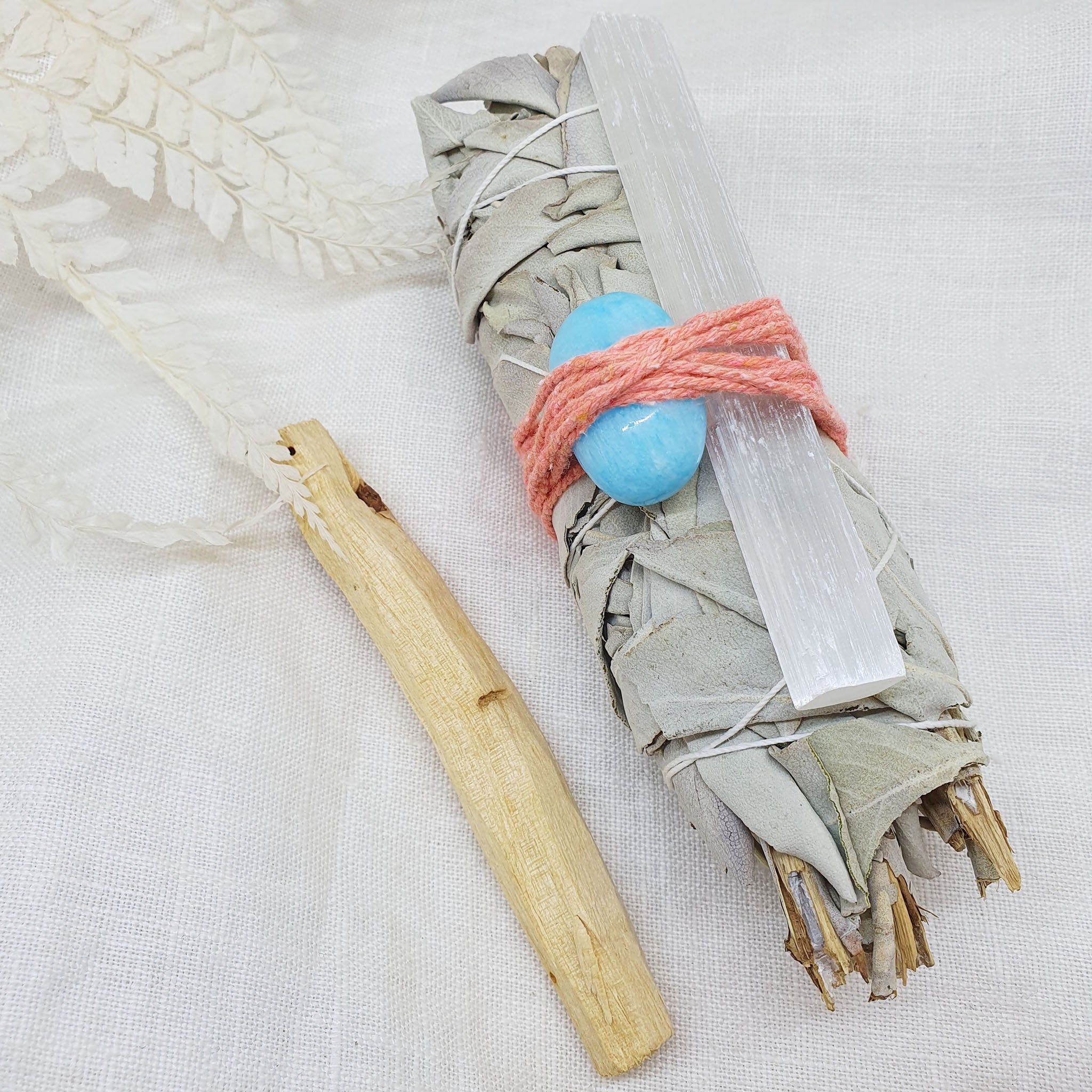 white sage palo santo with amazonite and selenite