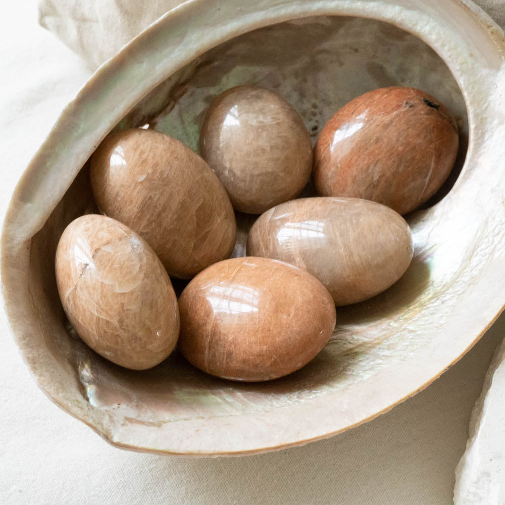 peach moonstone palm stones