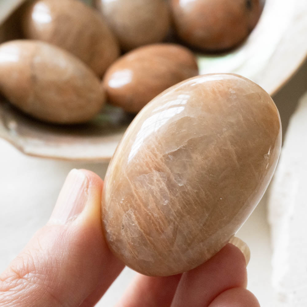 peach moonstone palm stone