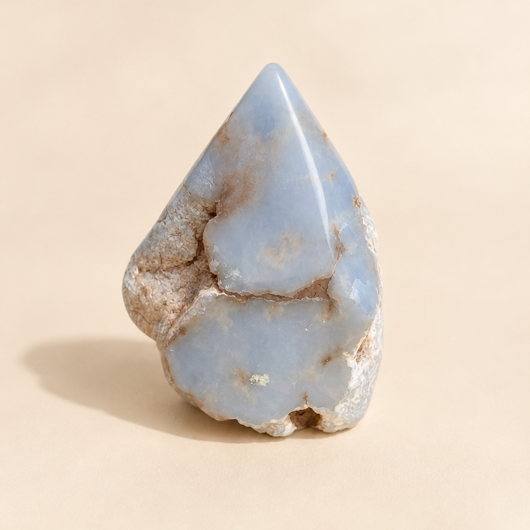 Angelite stone on a beige background