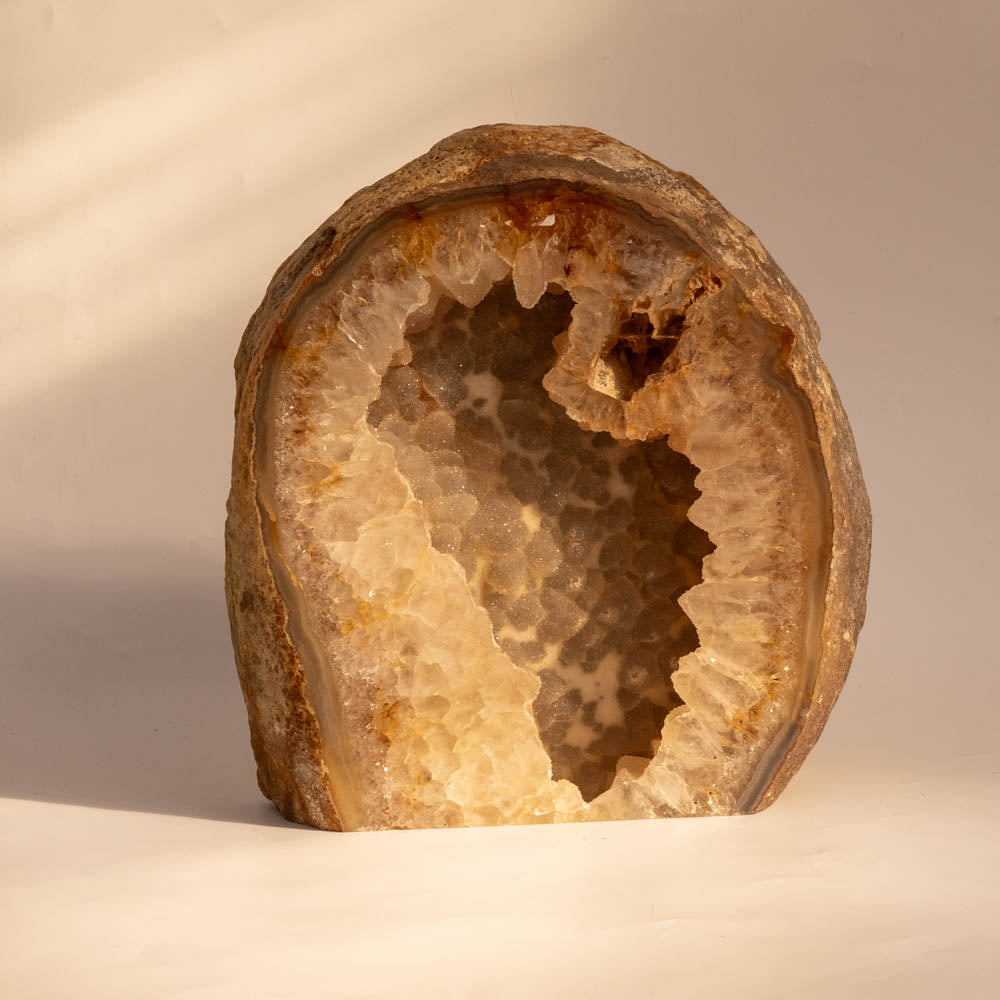 Geode crystal on a beige background