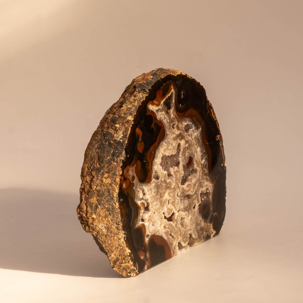Close-up of Natural Agate Geode on a beige background