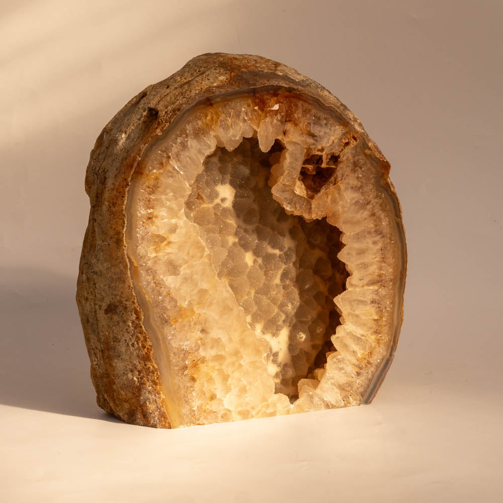 Geode crystal on a beige background