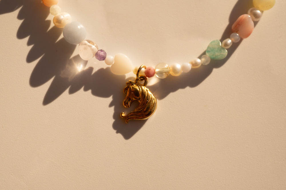 Enchanted pony charm beaded necklace