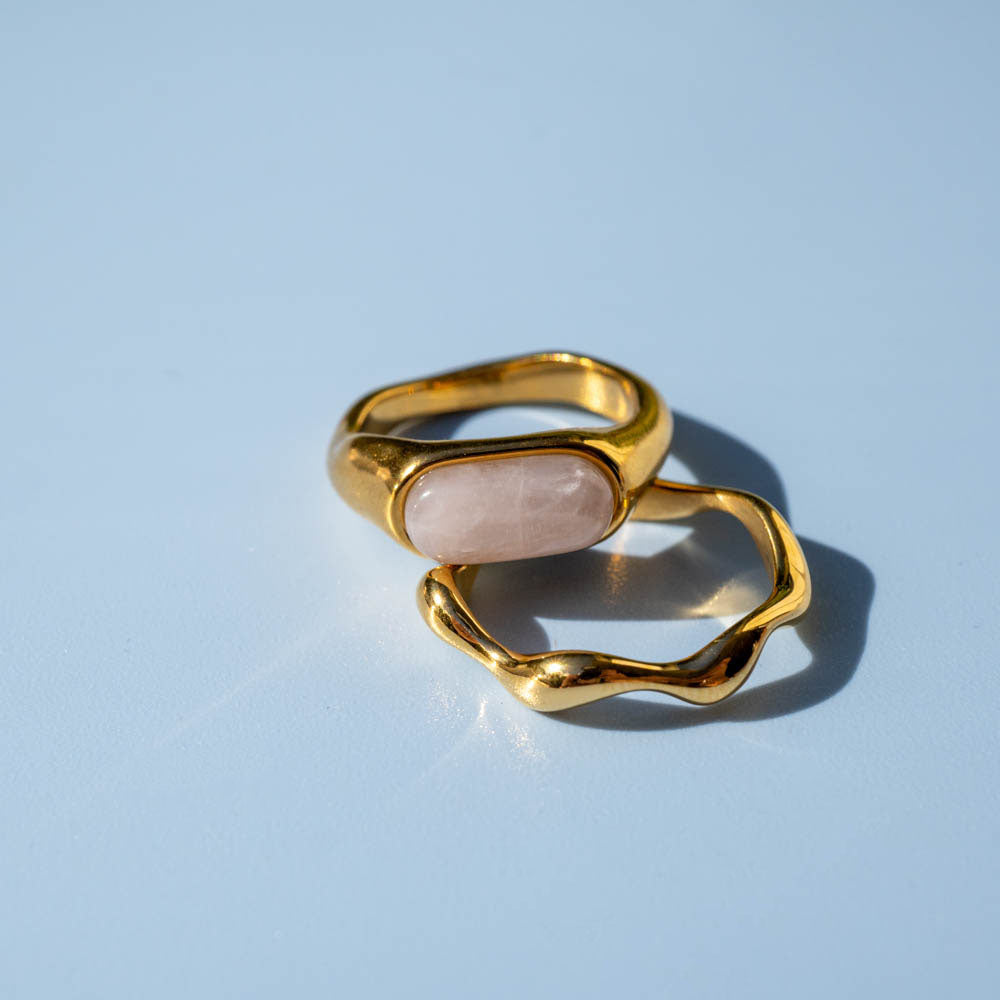 rose quartz and wavry curve rings
