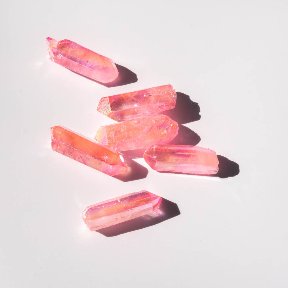 pink aura crystal point