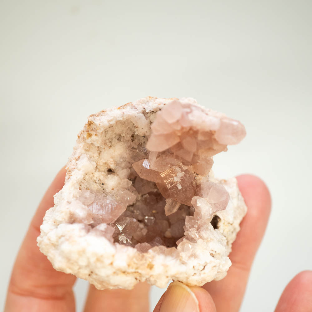 pink amethyst geode half