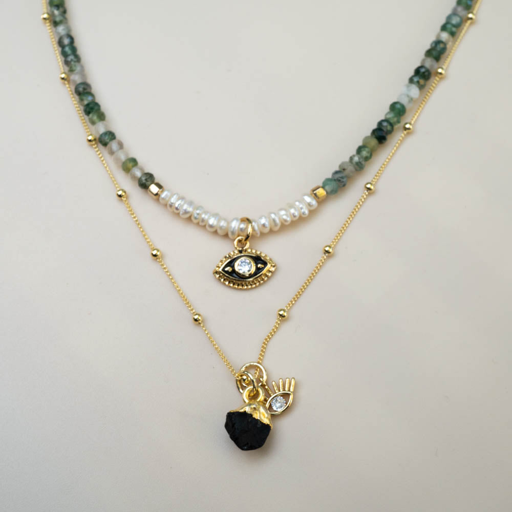 tourmaline evil eye necklace layered with green agate beaded necklace