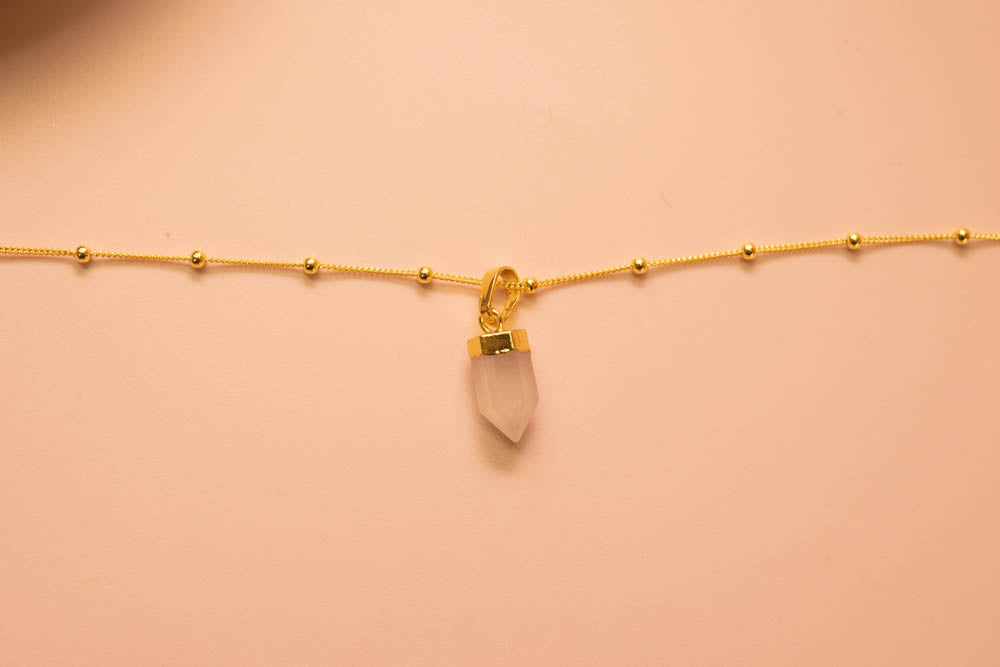 Rose quartz point crystal pendant gold ball chain
