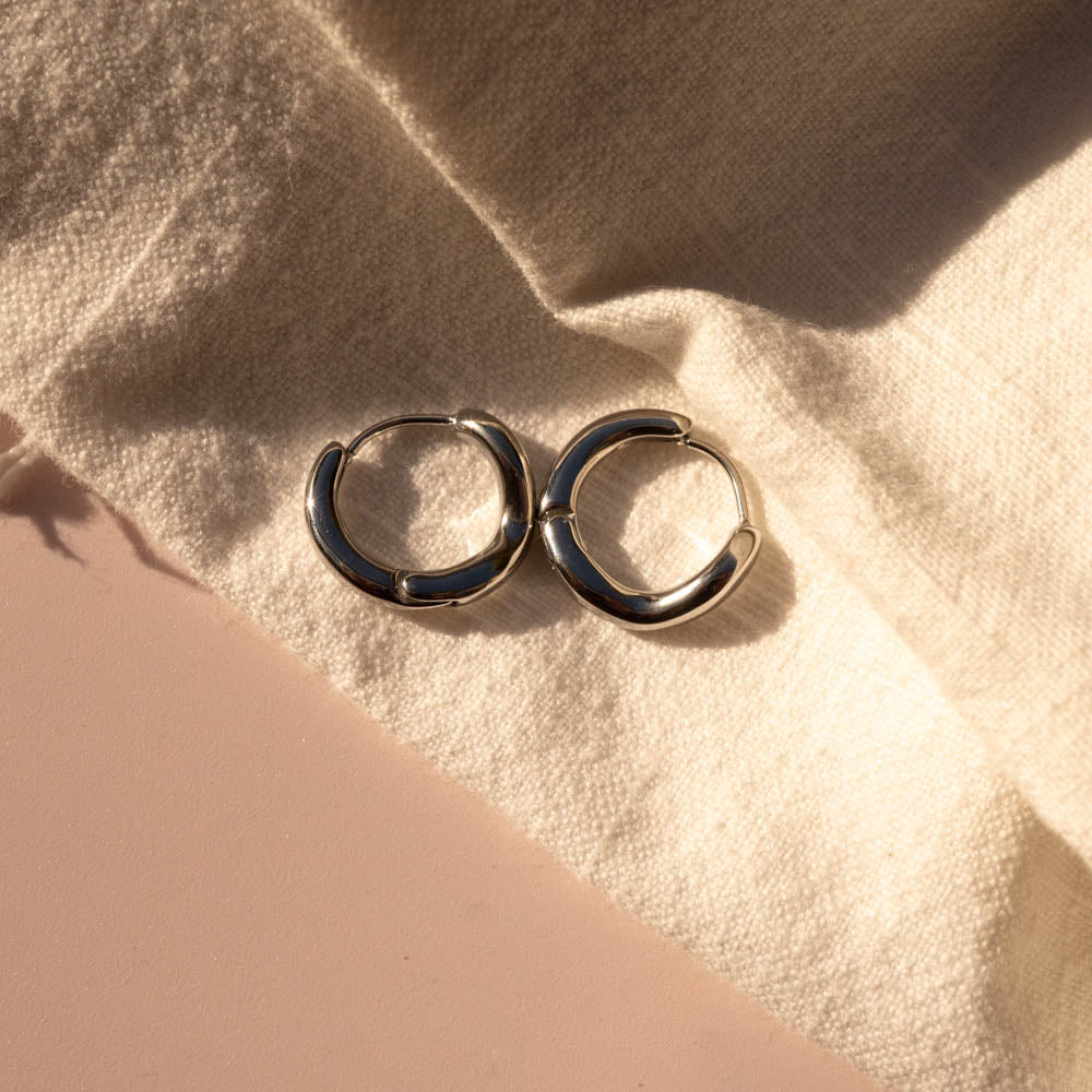 silver wavey hoops