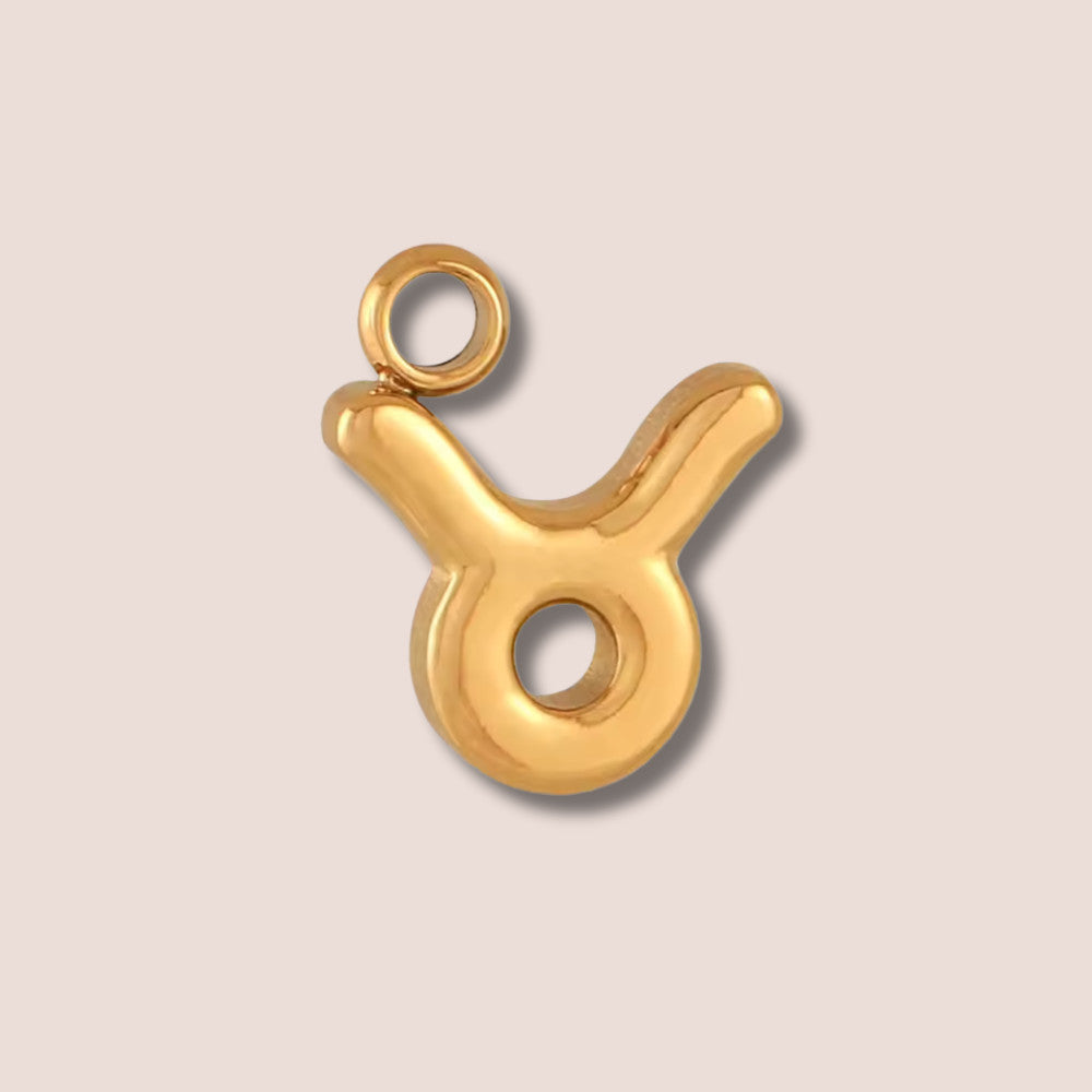 taurus gold charm