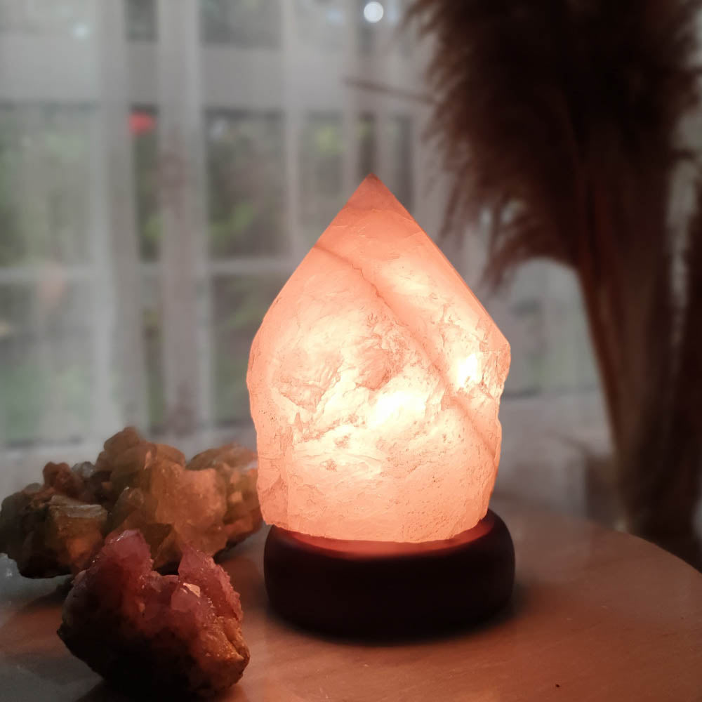 Polished Rose Quartz Crystal Lamp with Dark Wooden Base