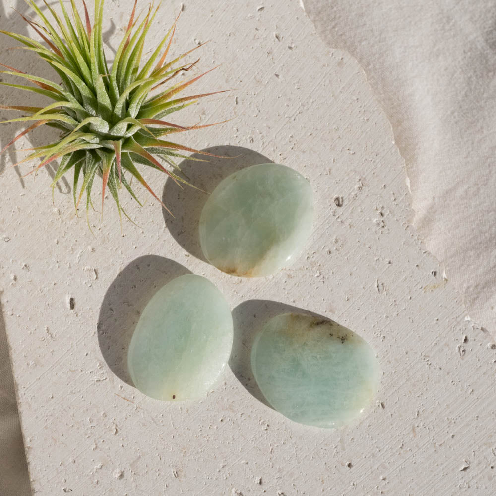 Aquamarine palm stones