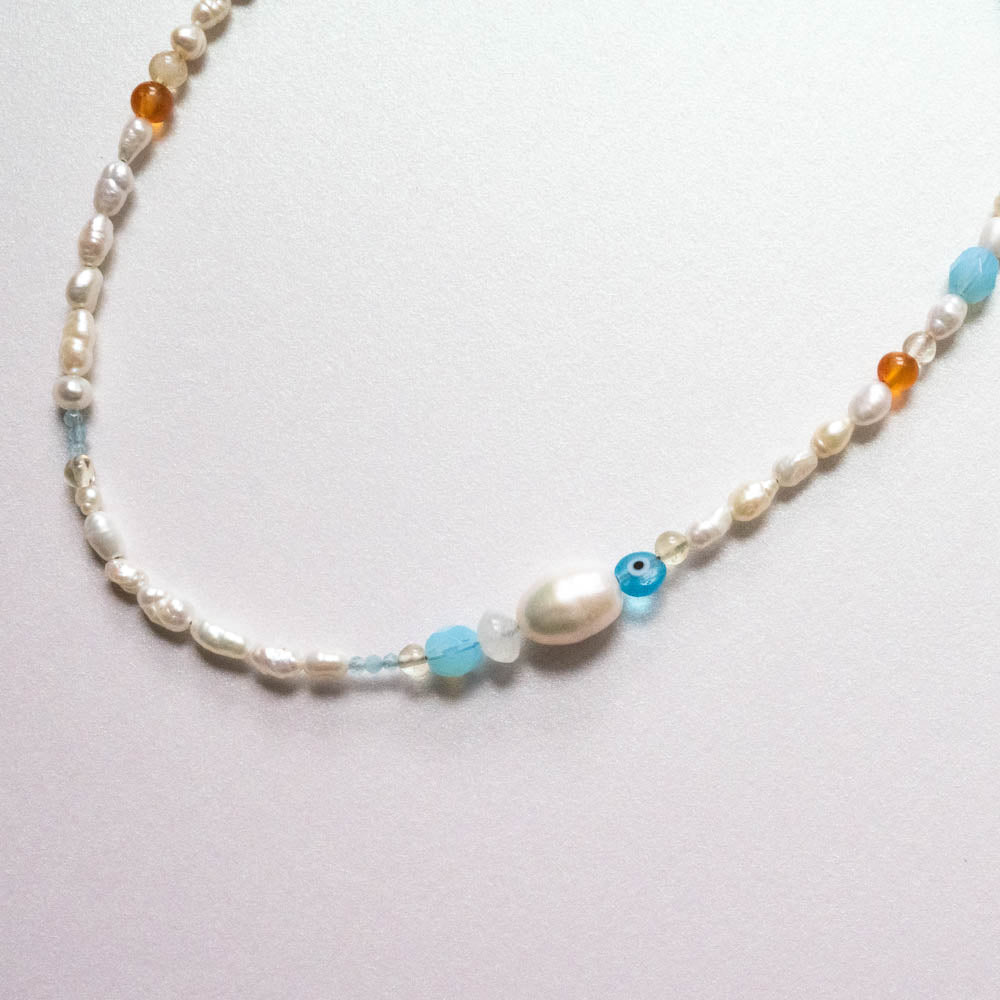 Athena Evil eye pearl necklace 