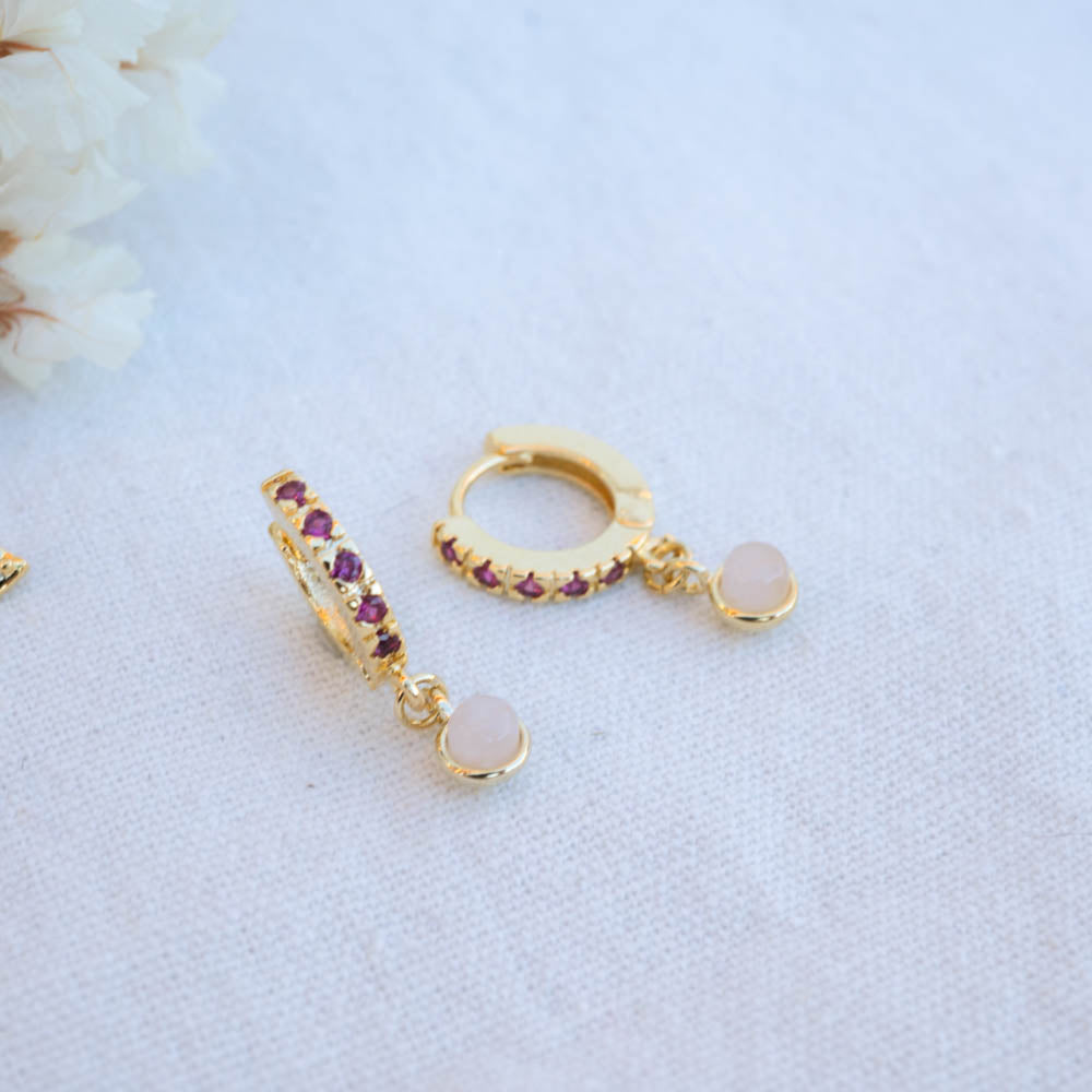 Ruby gold huggies with rose quartz charms 