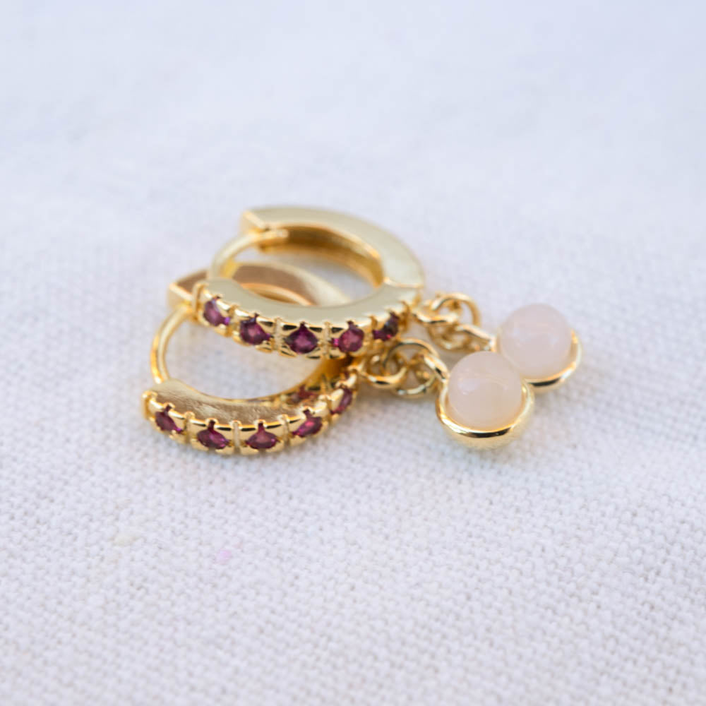 Ruby gold huggies with rose quartz charms