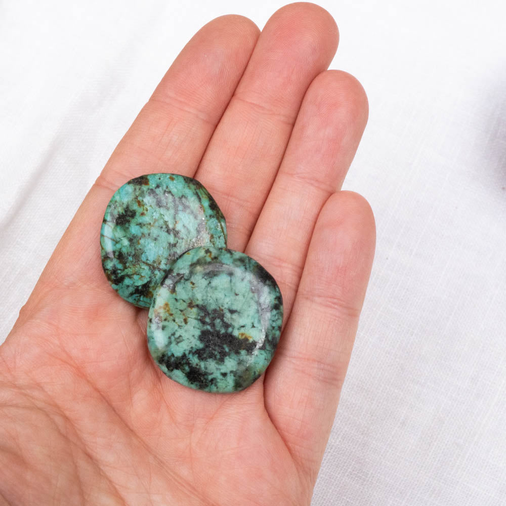 Turquoise palm stones