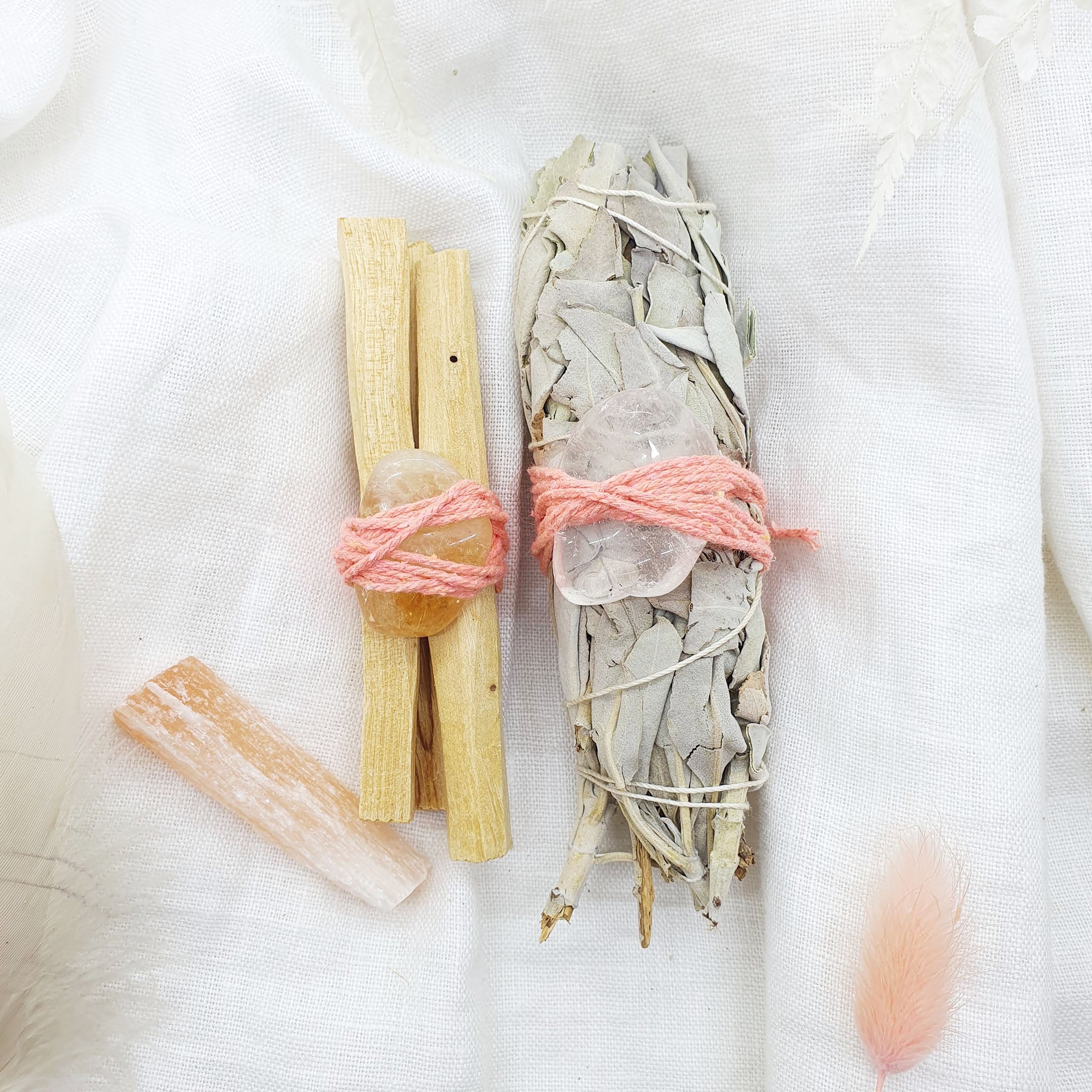 smudge stick kit with palo santo, white sage, peach selenite, citrine and quartz